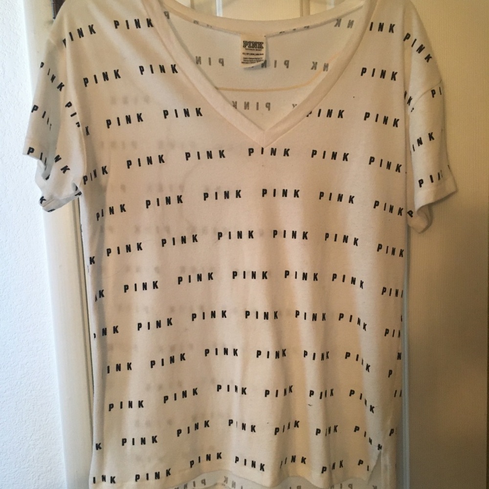 Pink xs v neck t shirt worn once runs large